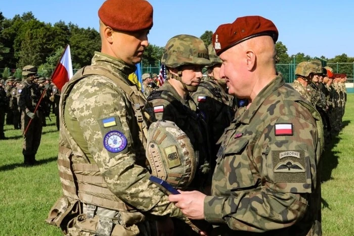 Territorial Defense with Ukrainians. Involving Migrants in Defense Units